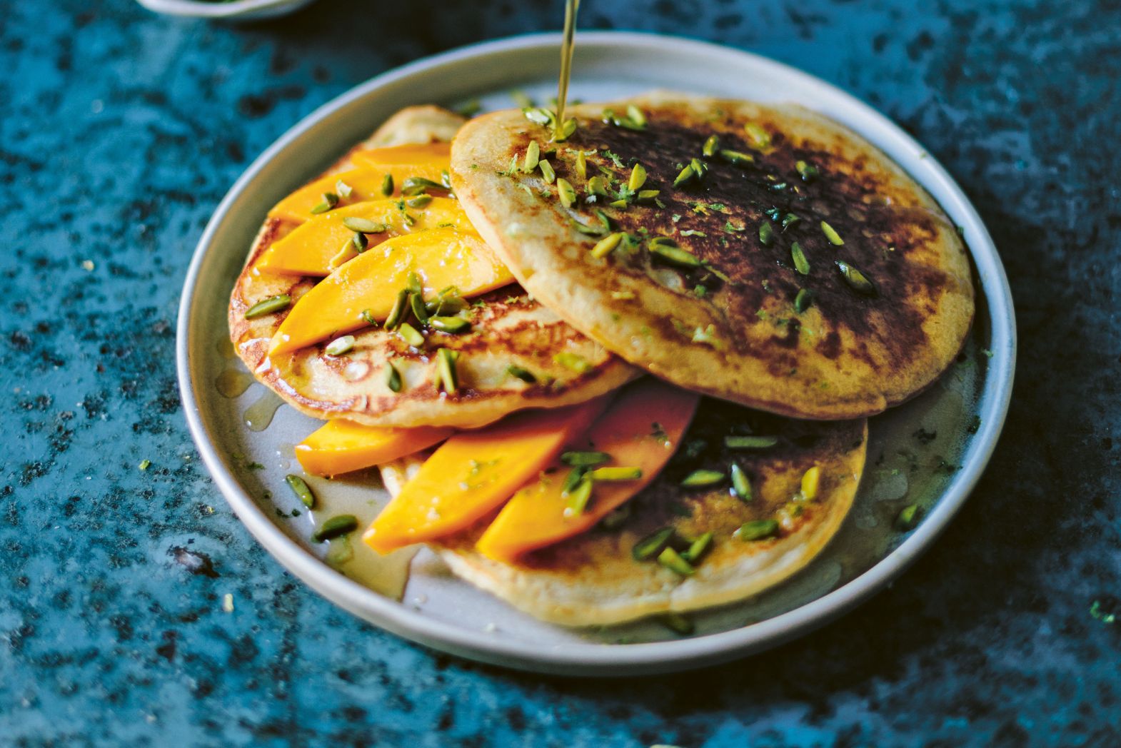 Jalebi pancakes with Alphonso Mango & Pistachio, by Sabrina Gidda