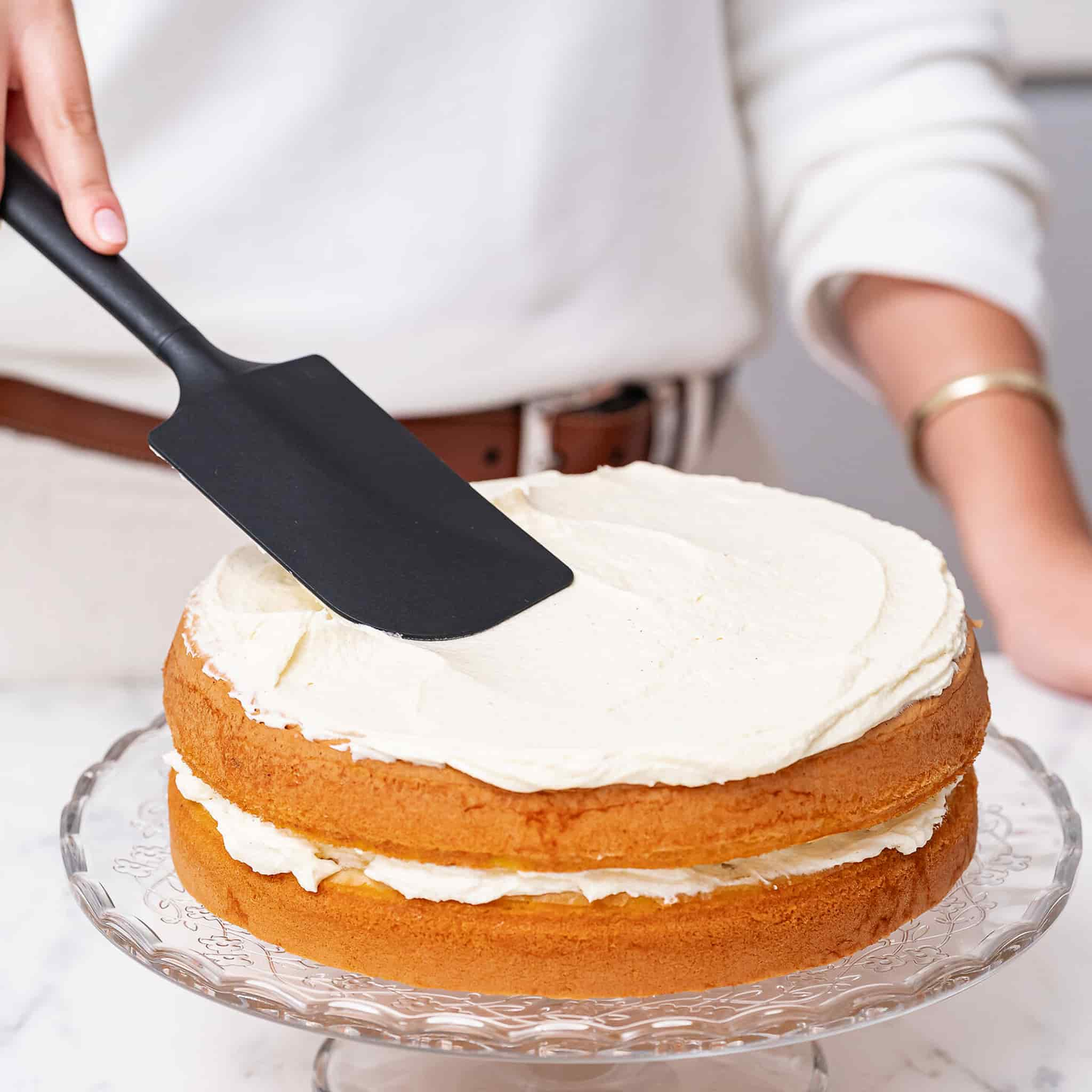 Triangle Black Silicone Spatula used on cake