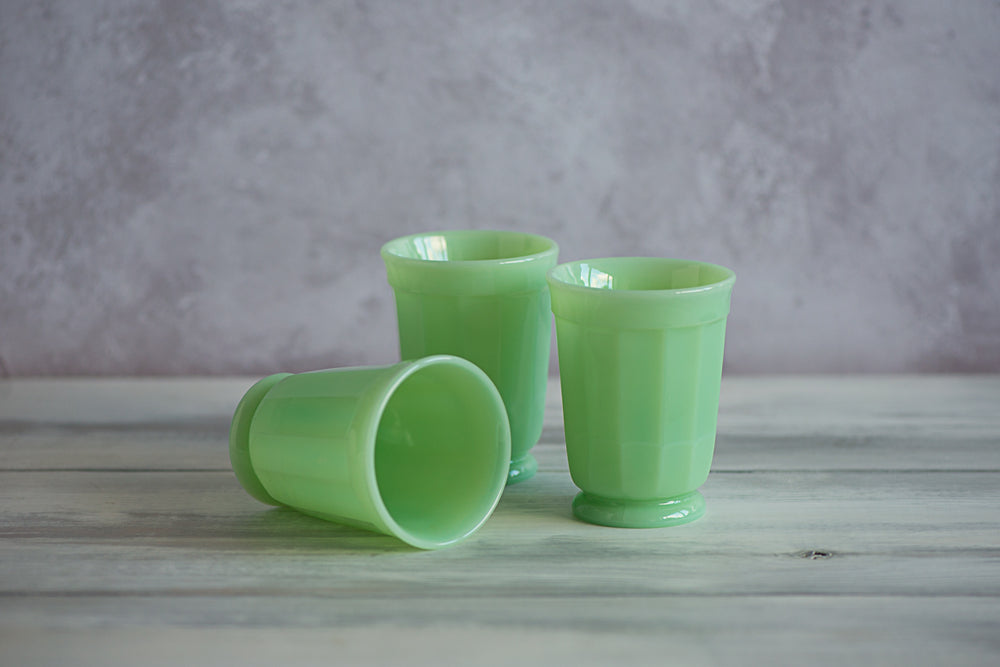 three mosser glass tumblers on grey background jadeite